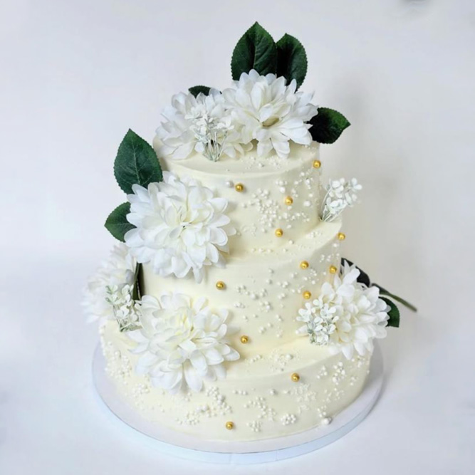 Custom Nikkah cake with gold leaf and florals